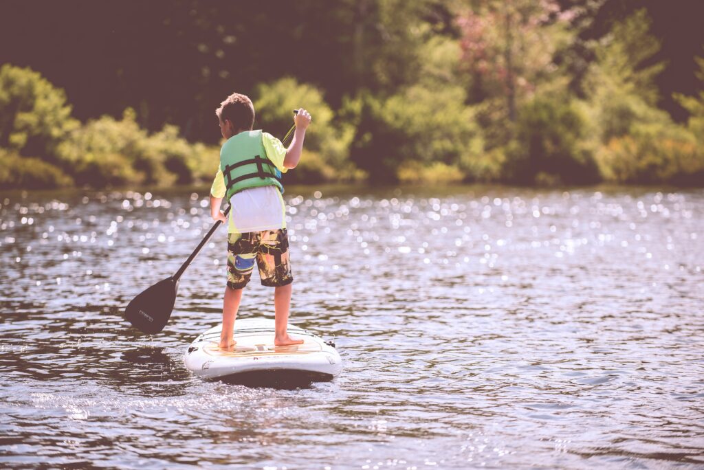 Child paddleboarding on Table Rock Lake